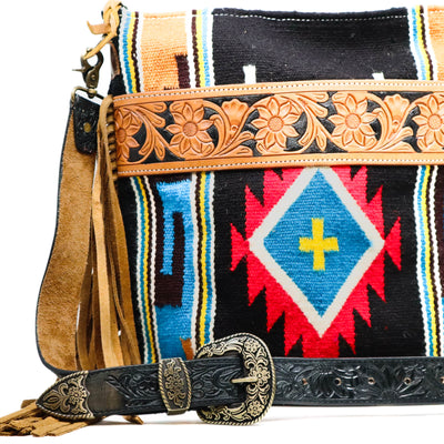Prairie Spirit Adjustable hand carved leather replacement strap with floral design on southwestern style bag