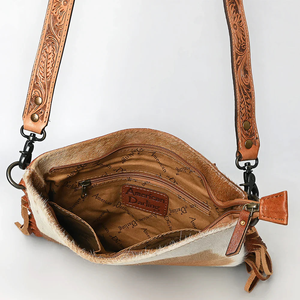 American Darling Messenger bag ADBGS192TAW with hair-on cowhide leather, adjustable tooled leather strap, leather fringe, and secure YKK zippers interior view