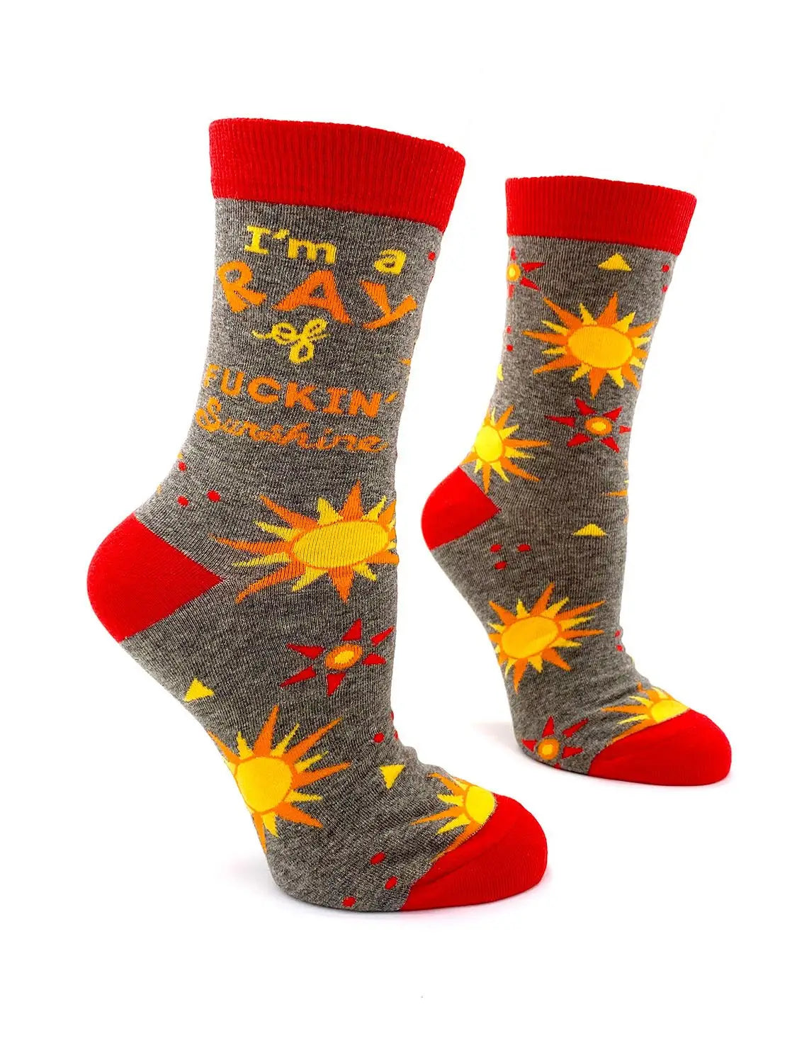 Women's crew socks with yellow sun patterns on gray background and red cuff, heel, and toe, featuring the phrase 