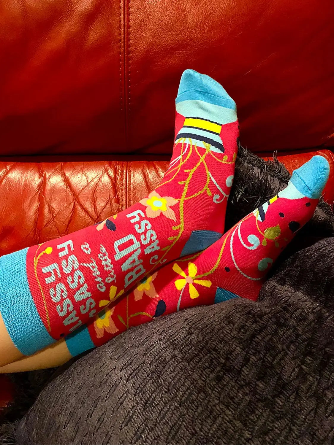 Colorful women's crew socks with "Classy Sassy and a Little Bad A**y" text, floral and striped design, soft and breathable.