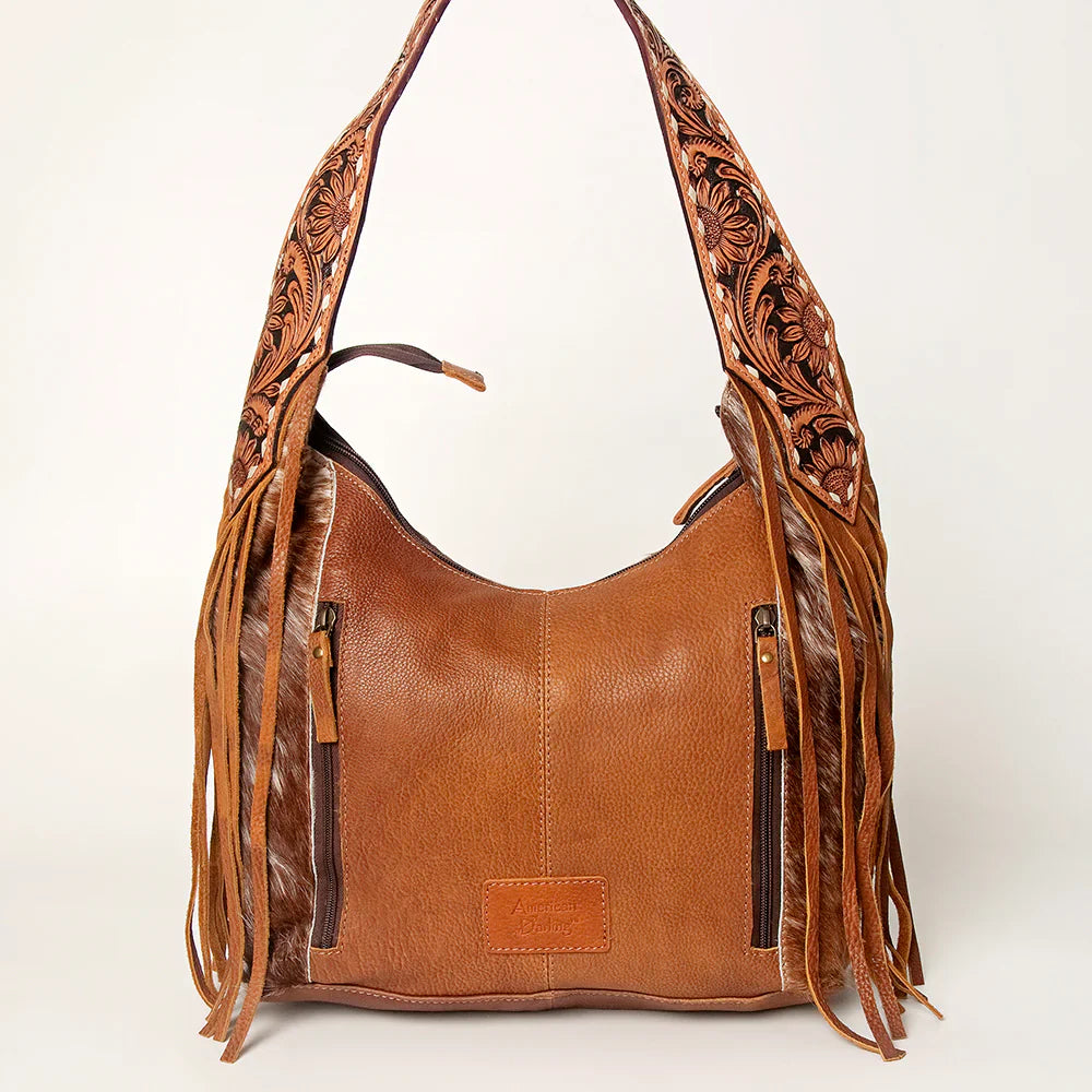 American Darling Hobo ADBGI112C, genuine full grain leather handbag with fringe, cowhide hair-on accents, adjustable strap, hand tooled pattern, YKK zippers, 14in x 17in x 5in.