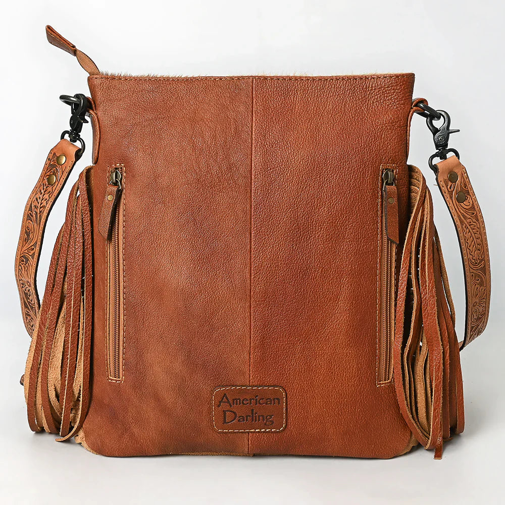 American Darling Messenger Bag ADBGS192TAW in brown full-grain cowhide leather with hand-tooled adjustable strap, leather fringe, and vertical zipper pockets