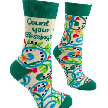 Women's green crew socks with floral swirl patterns and "Count Your Blessings" text, soft breathable cotton blend, size 5-10.