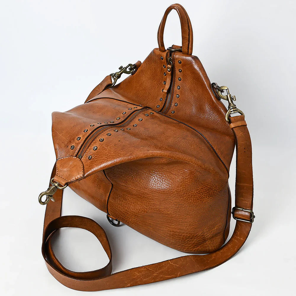 Spaghetti Western Backpack SWC194TAN in full grain leather with antique finish metal fittings and adjustable strap.