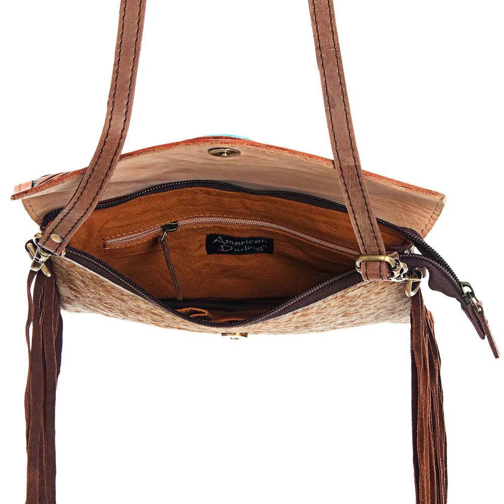 American Darling Small Crossbody Messenger Bag in genuine leather with cowhide accents, leather fringes, and turquoise stone detailing.