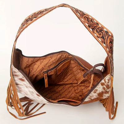 American Darling Hobo ADBGI112C genuine leather bag with cowhide accents and fringes.