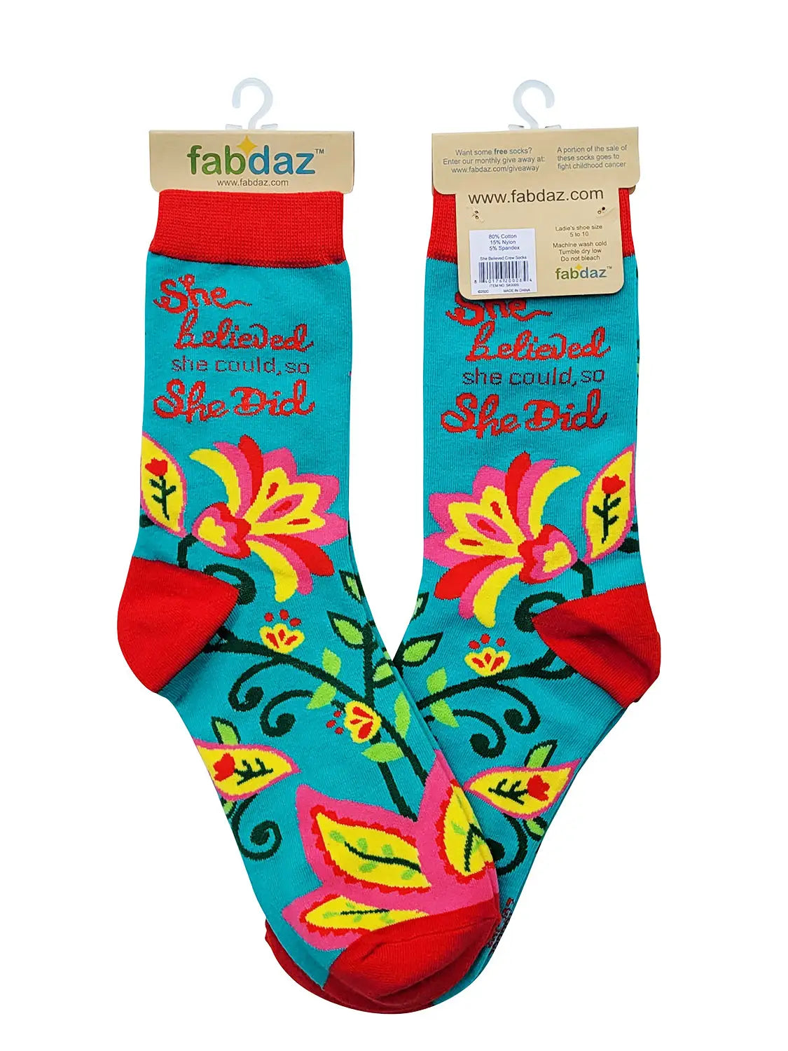 Colorful "She Believed She Could, So She Did" women's crew socks with floral design and red accents, made of cotton blend.