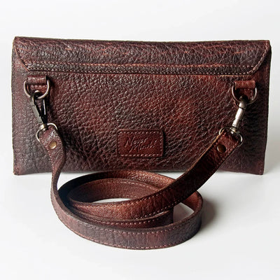 Never Mind Small Crossbody Bag in full grain leather with antique metal fittings and YKK zippers.