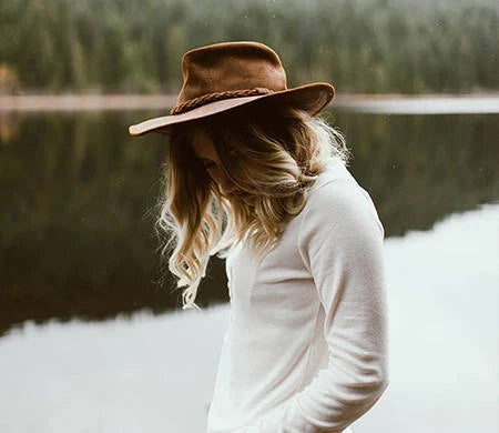 Pre-order Minnetonka Fold Up Hat with premium leather construction and braided hatband.