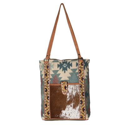 Ohlay Tote OHV188 with hand-tooled cowhide leather and vintage print canvas, featuring an adjustable leather strap.