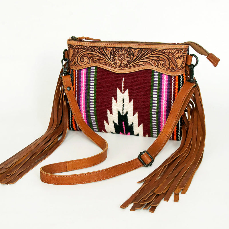 American Darling Crossbody messenger bag with hand-tooled leather, wool saddle blanket, leather fringes, and antique metal fittings