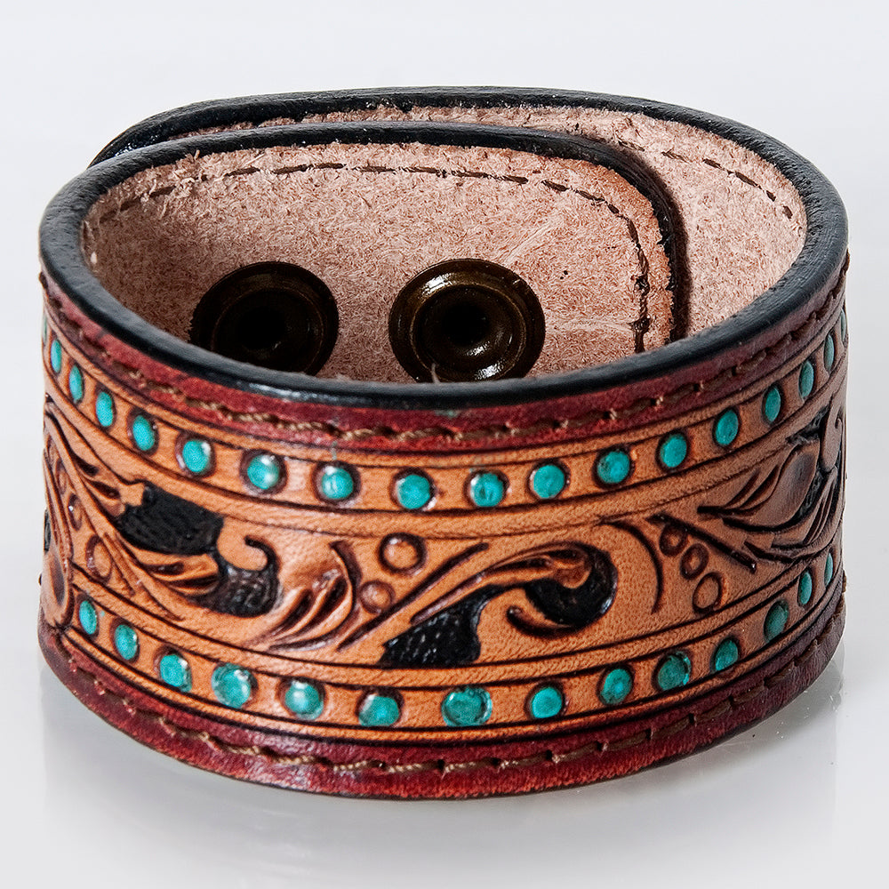 American Darling leather bracelet with turquoise studs and carved floral design
